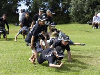 Boys playing games outside